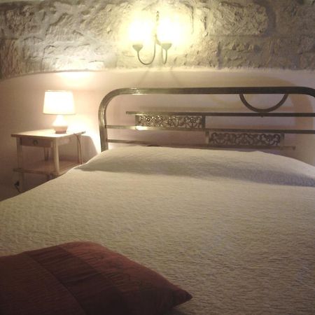 Apartmán 4 Assi Pitigliano Pokoj fotografie