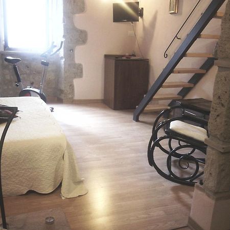 Apartmán 4 Assi Pitigliano Pokoj fotografie